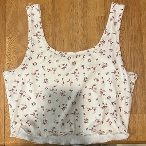 No tags but has never been worn. Front and back look the same.